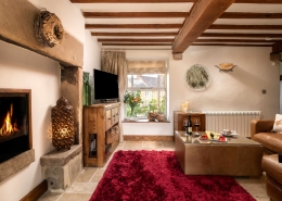 Heather Cottage, Lounge looking out at Kirk Ireton