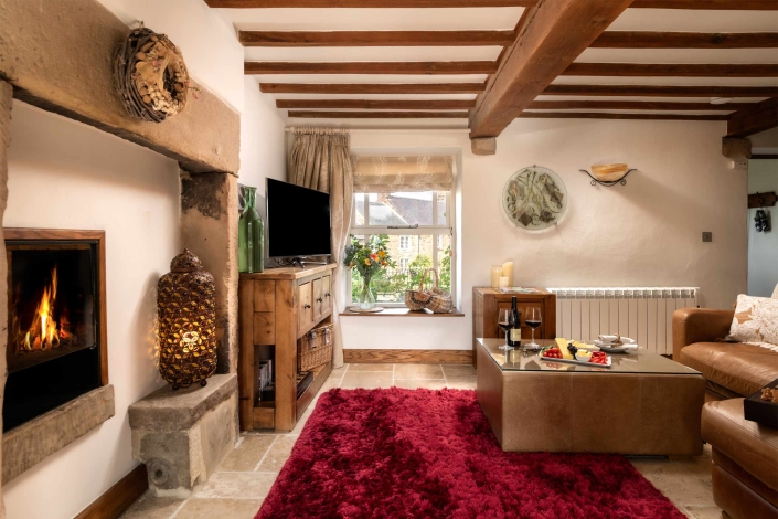 Heather Cottage, Lounge looking out at Kirk Ireton